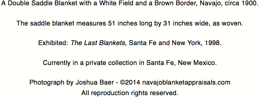 brown and white navajo double saddle blanket